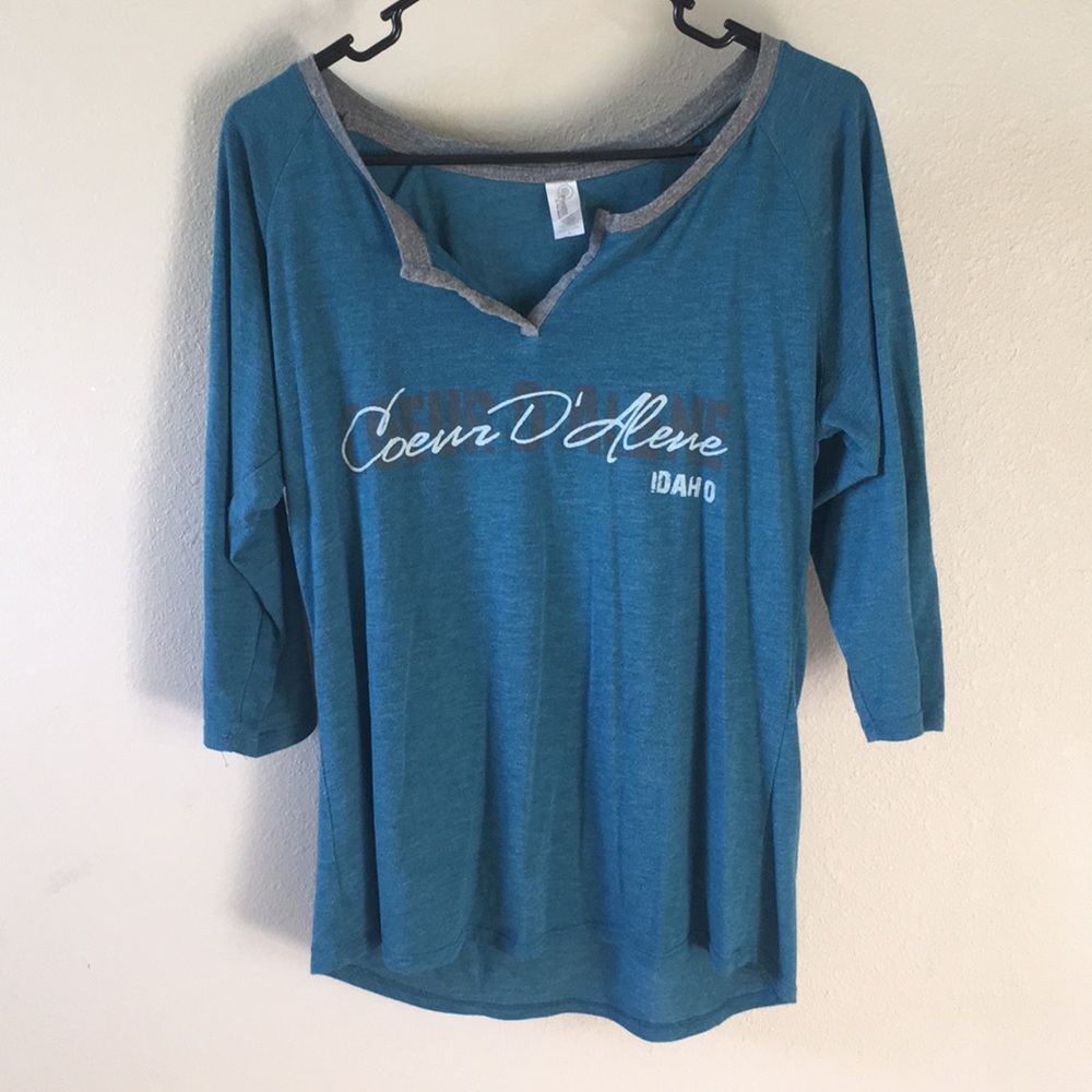 Blue “long sleeve” top